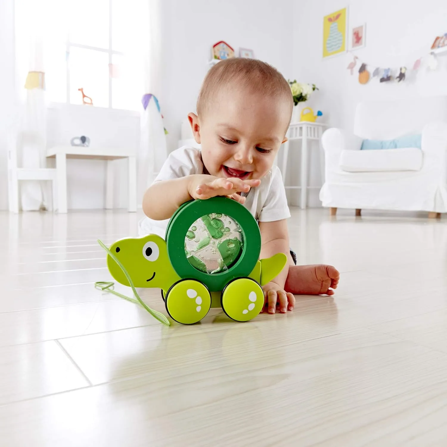 Hape Tito Pull Along | Wooden Turtle with Swirling Shell Pull Toddler Toy, Green