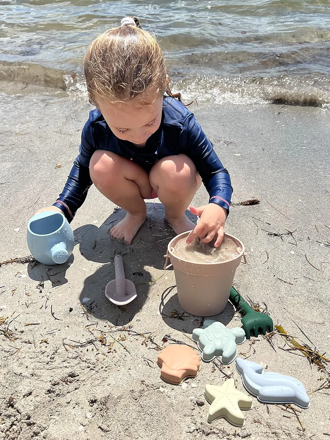 Silicone Beach Toys - Beach Bucket Set with Shovel, 4 Sand Molds - Travel-Friendly Kids Sand Toys in Net Carrying Bag - Safe Baby Sand Toys - Dishwasher-Safe (Light Green)